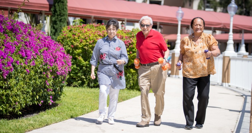 Residents enjoying a nice walk around the community