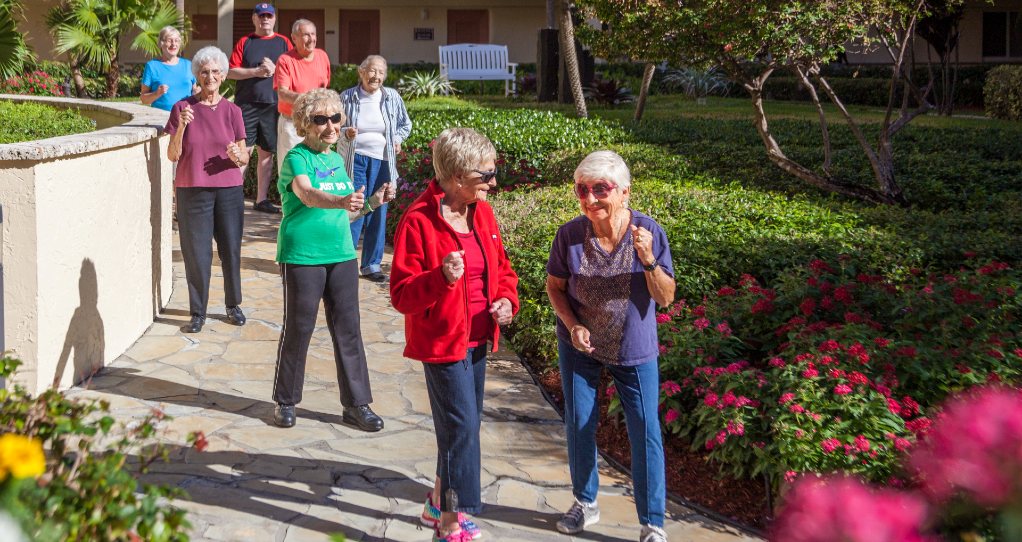 people going for a walk around the gardens